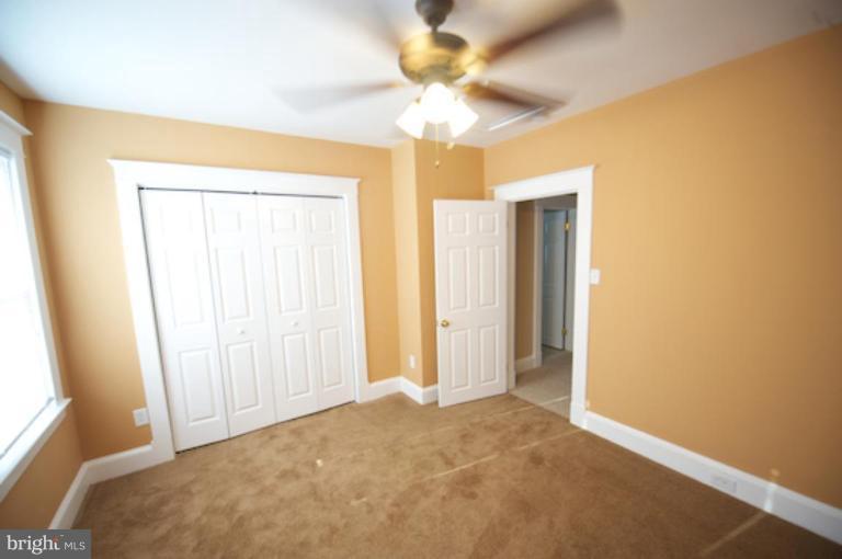 1808 Kinship Road Dundalk, MD 21222 - Photo 12 of 19 a view of a chandelier in a room