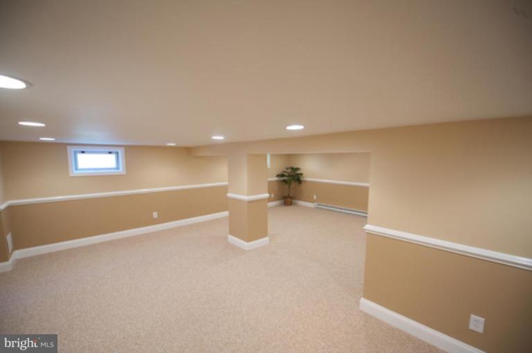 1808 Kinship Road Dundalk, MD 21222 - Photo 15 of 19 a view of a room with wooden floor