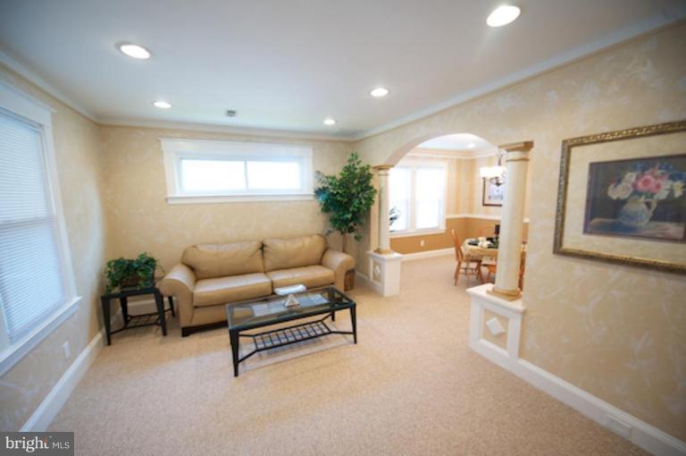1808 Kinship Road Dundalk, MD 21222 - Photo 6 of 19 a living room with furniture and a flat screen tv