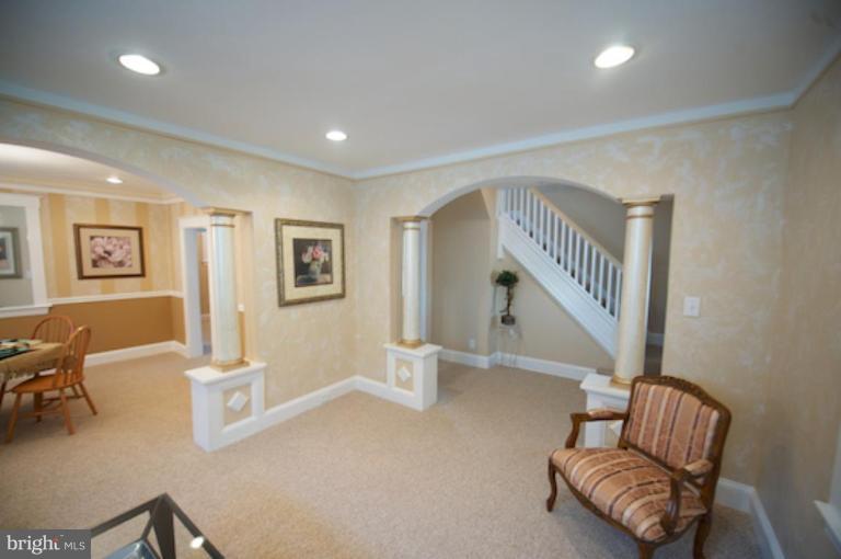 1808 Kinship Road Dundalk, MD 21222 - Photo 7 of 19 a living room with furniture and a couch