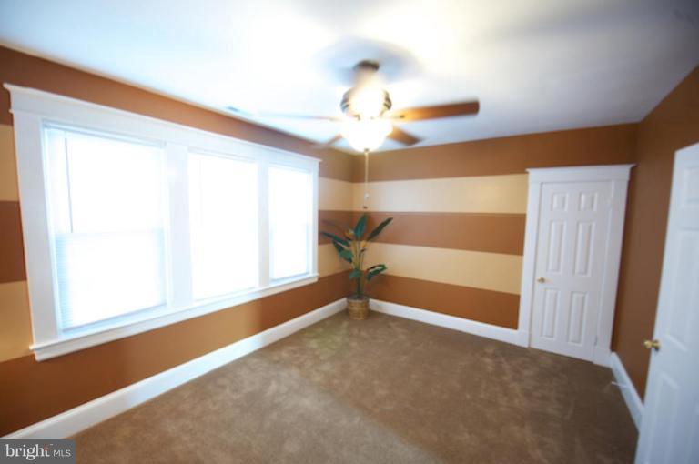 1808 Kinship Road Dundalk, MD 21222 - Photo 8 of 19 a view of an empty room with a window