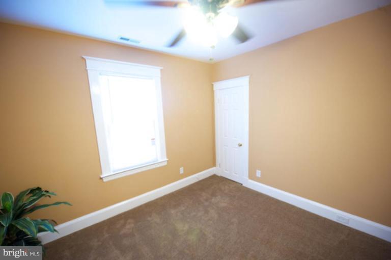 1808 Kinship Road Dundalk, MD 21222 - Photo 10 of 19 an empty room with a window