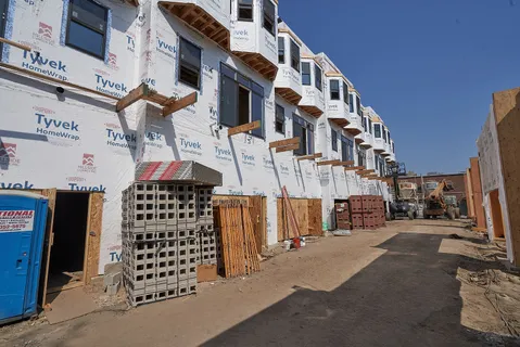 a view of a large building with a street