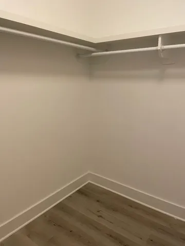 a view of a small space with a fan