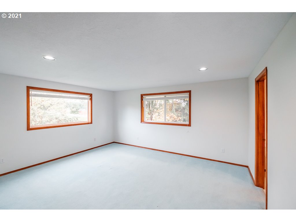15305 Oakdale Road Dallas, OR 97338 - Photo 13 of 32 a view of an empty room with a window