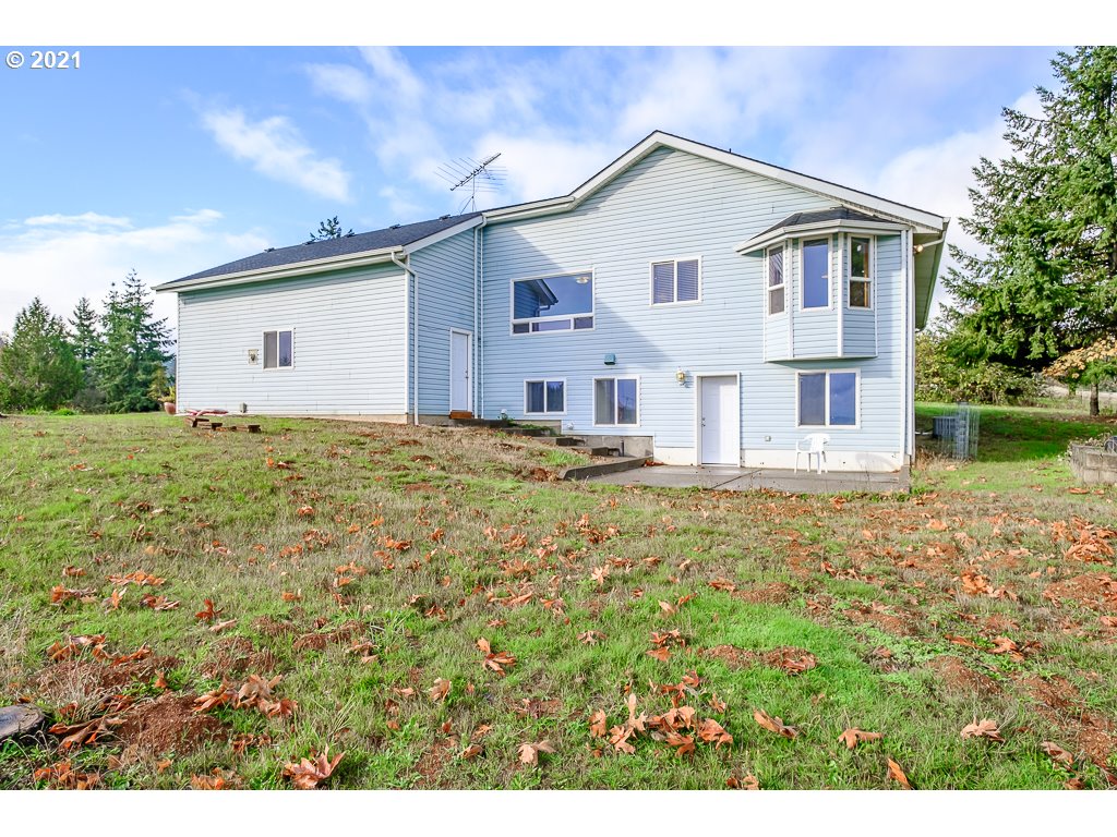 15305 Oakdale Road Dallas, OR 97338 - Photo 27 of 32 a view of a house with a yard