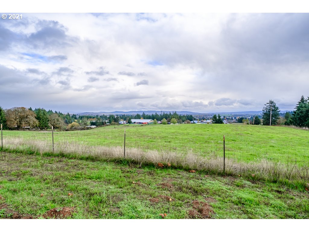 15305 Oakdale Road Dallas, OR 97338 - Photo 31 of 32 a view of a lake with a big yard