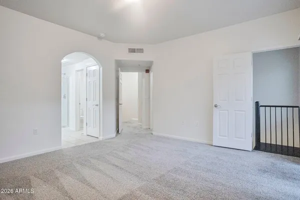 an empty room with windows