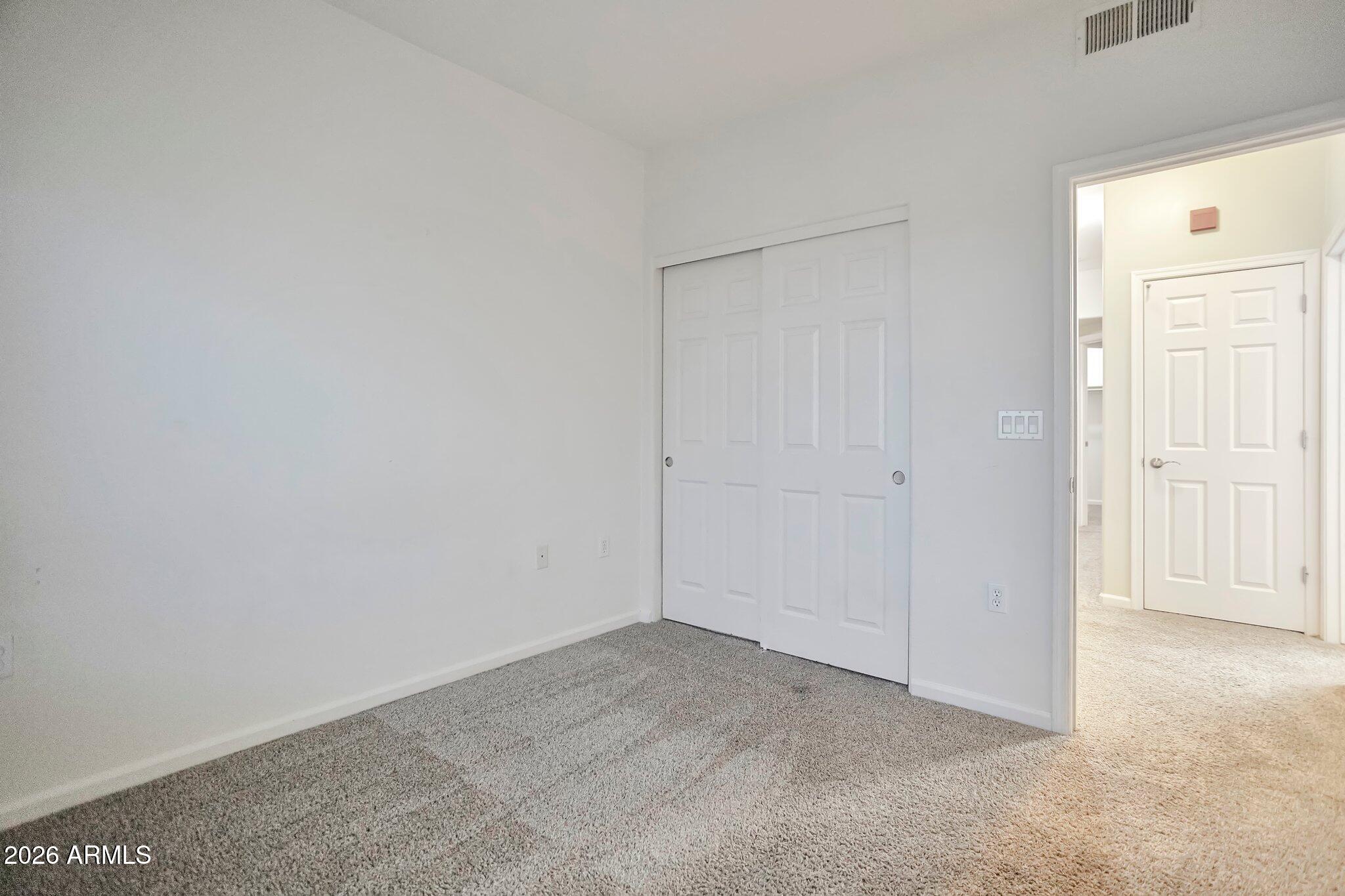 1920 East Bell Road, Unit 1006 Phoenix, AZ 85022 - Photo 23 of 25 a view of an empty room