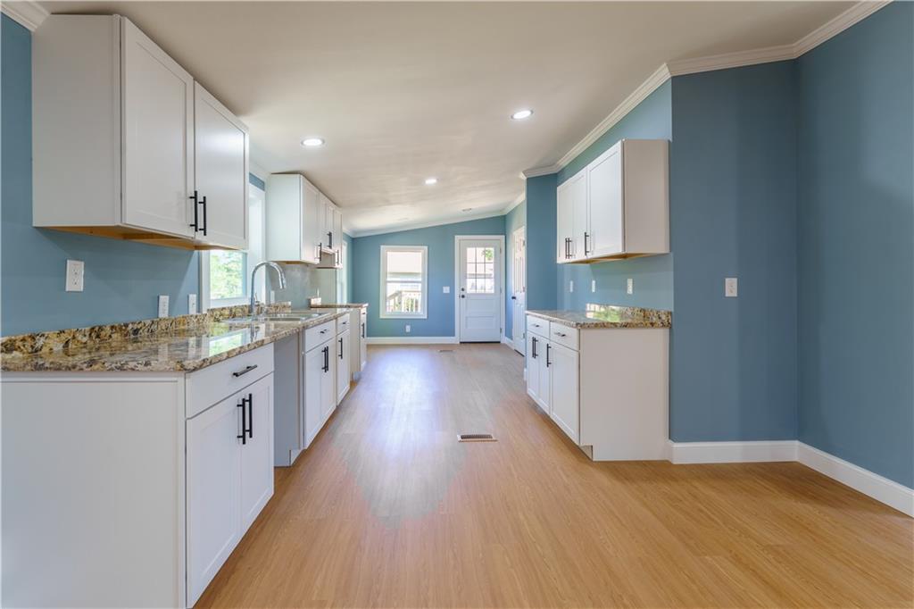 1412 Floyd Circle Gainesville, GA 30507 - Photo 12 of 38 a large kitchen with a lot of counter space