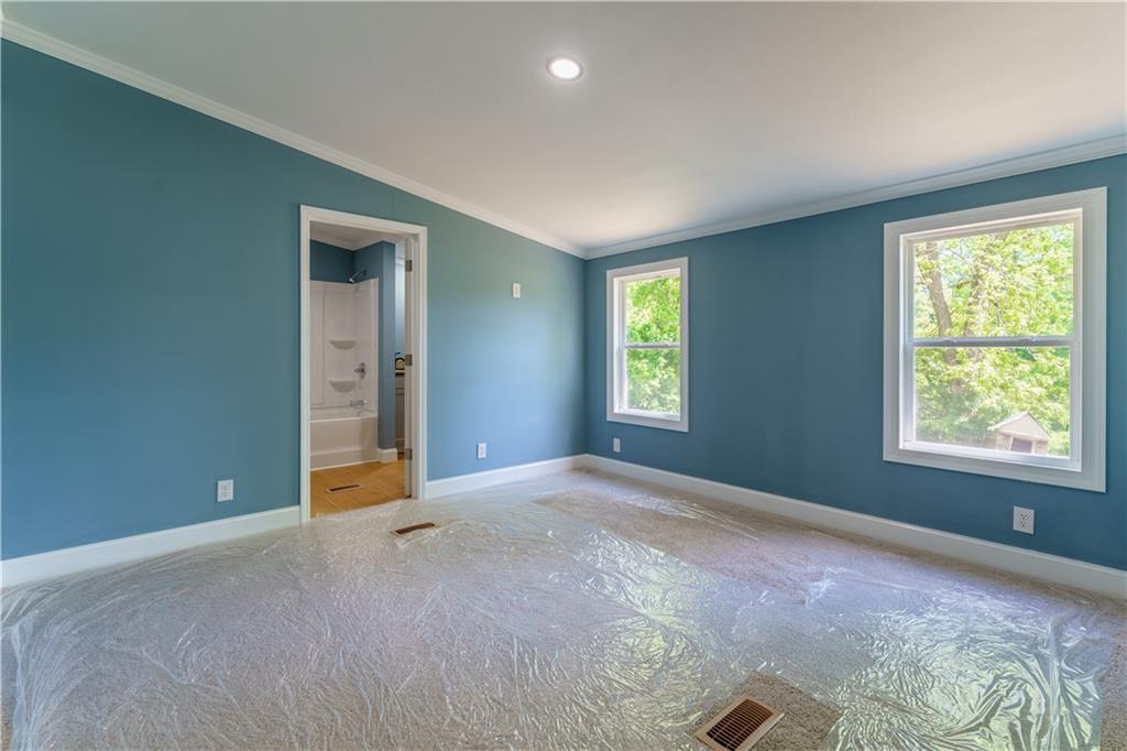 1412 Floyd Circle Gainesville, GA 30507 - Photo 18 of 38 a view of an empty room with a window