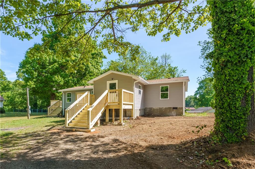 1412 Floyd Circle Gainesville, GA 30507 - Photo 2 of 38 a view of a house with a yard