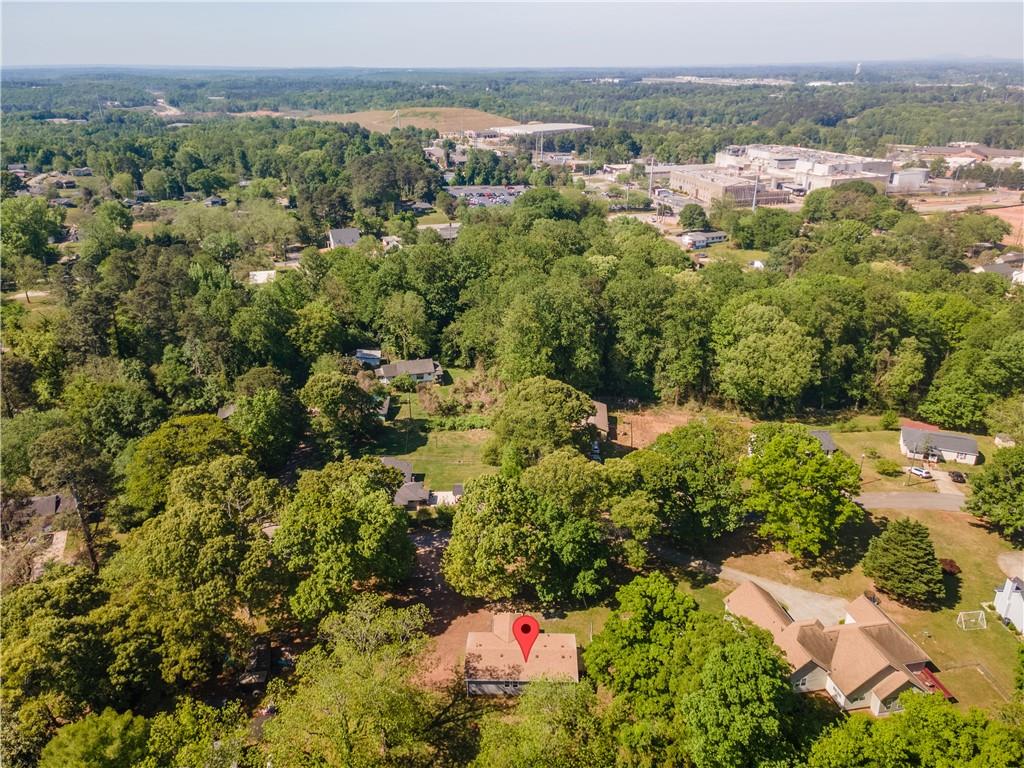 1412 Floyd Circle Gainesville, GA 30507 - Photo 38 of 38 an aerial view of a houses with a yard