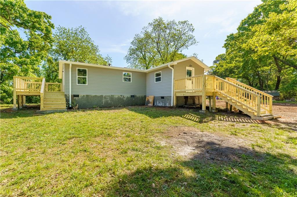 1412 Floyd Circle Gainesville, GA 30507 - Photo 5 of 38 a house view with a outdoor space