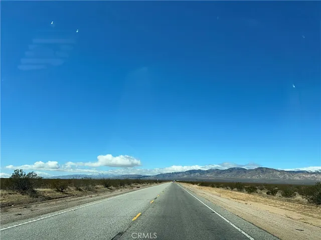 a view of a lake and a yard