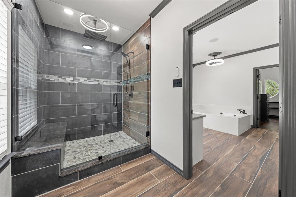 3091 Rockbridge Road McGregor, TX 76657 - Photo 28 of 40 a bathroom with a glass shower door