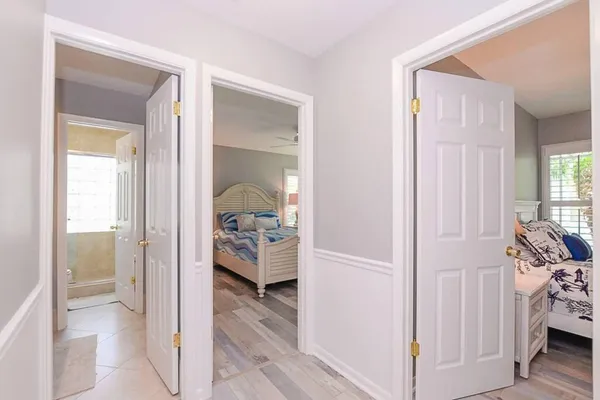 a view of a bedroom from a hallway