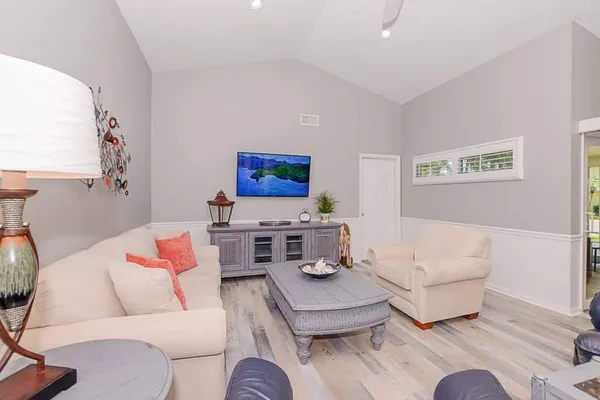 a living room with furniture and a couch