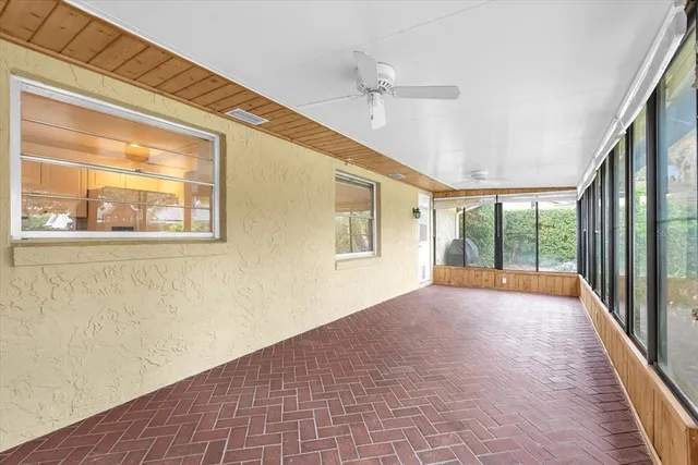 a view of a garden with a building in the background