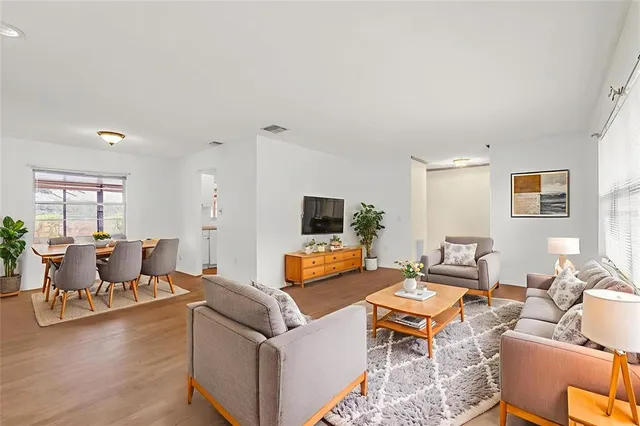 a kitchen with a sink cabinets and window