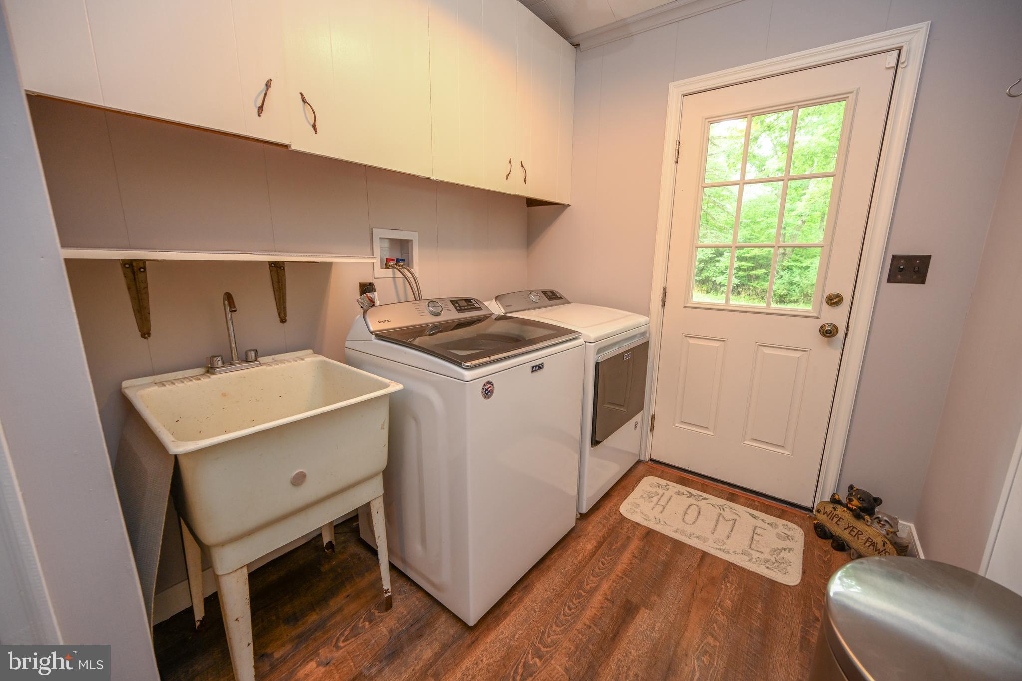 255 Foster Road Oakland, MD 21550 - Photo 19 of 84 Laundry/mudroom leading to the outside and garage.