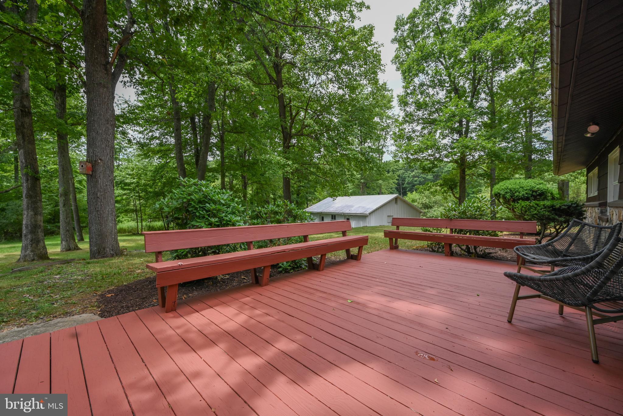 255 Foster Road Oakland, MD 21550 - Photo 38 of 84 Large deck over looking the beautiful back yard.