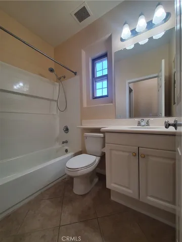 a view of a house with a patio