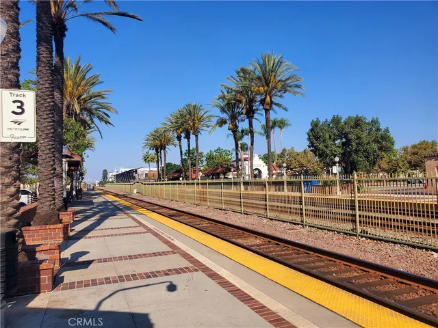 a view of a lake with houses in the back