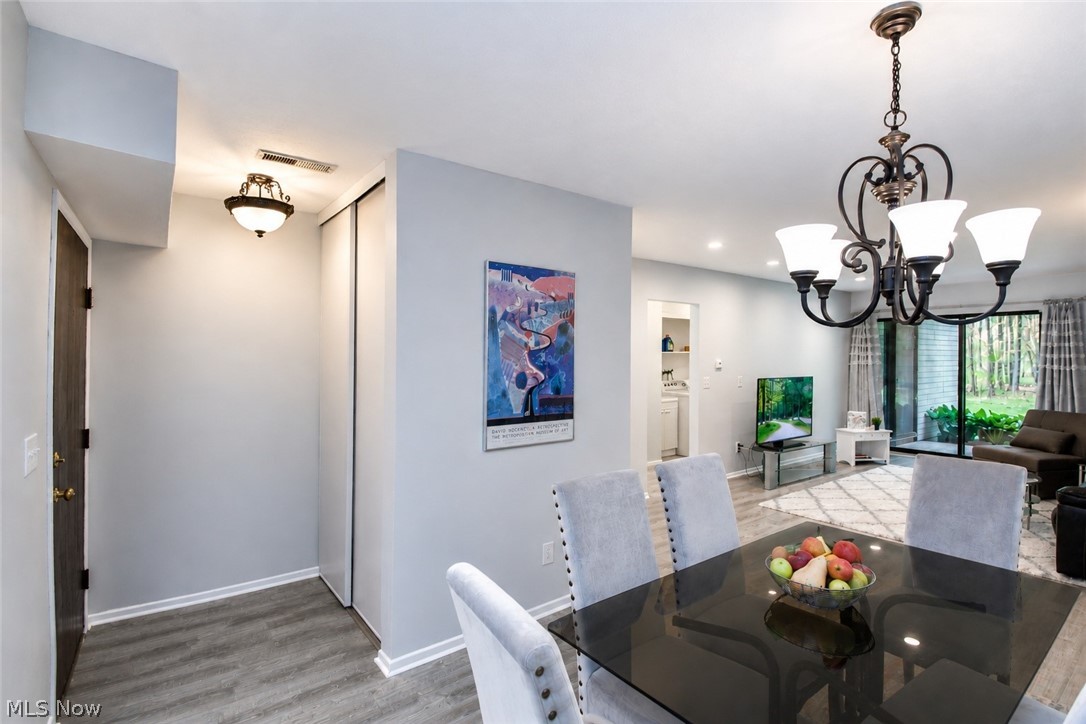 16575 Wren Road, Unit 3C Chagrin Falls, OH 44023 - Photo 4 of 29 Open-concept living space featuring recessed LED lighting, formal dining area and Luxury Vinyl f