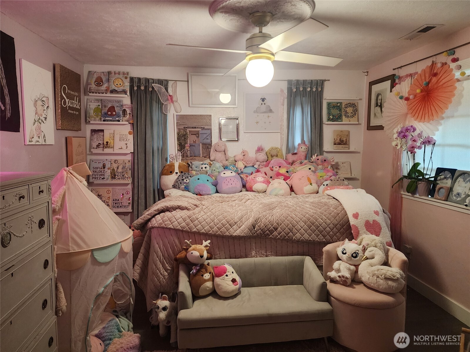 6217 Lackey Road Northwest Vaughn, WA 98394 - Photo 19 of 26 a bedroom with a bed couch and window