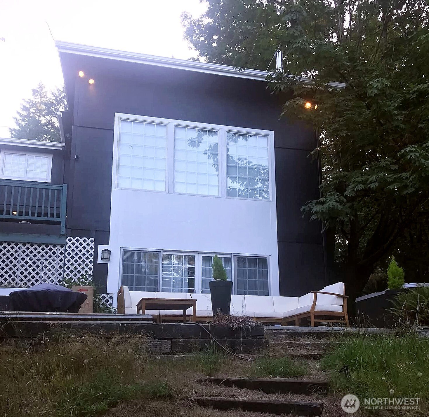 6217 Lackey Road Northwest Vaughn, WA 98394 - Photo 2 of 26 a front view of a house with a yard