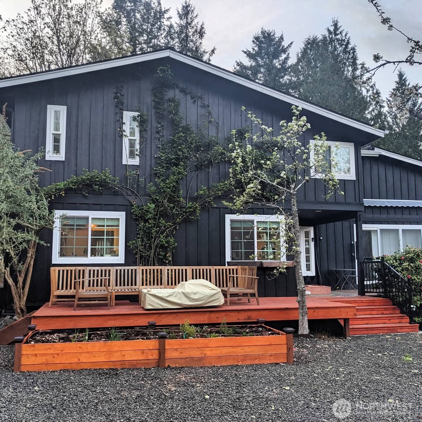 6217 Lackey Road Northwest Vaughn, WA 98394 - Photo 5 of 26 a house view with a outdoor seating space
