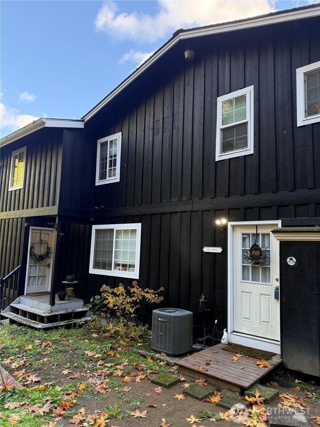 6217 Lackey Road Northwest Vaughn, WA 98394 - Photo 7 of 26 a view of a house with backyard porch and furniture