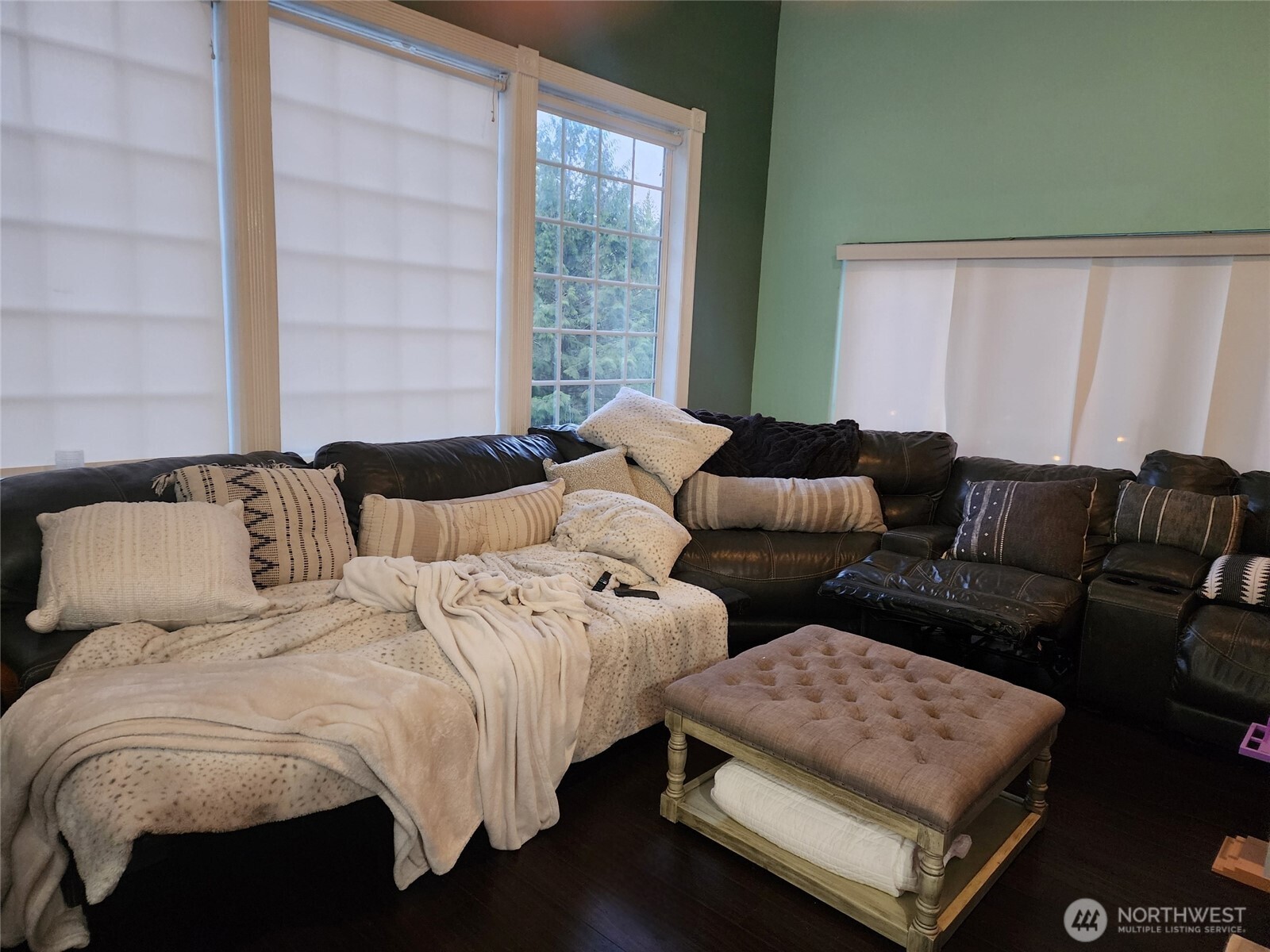 6217 Lackey Road Northwest Vaughn, WA 98394 - Photo 8 of 26 a bed room with two bed and a couch