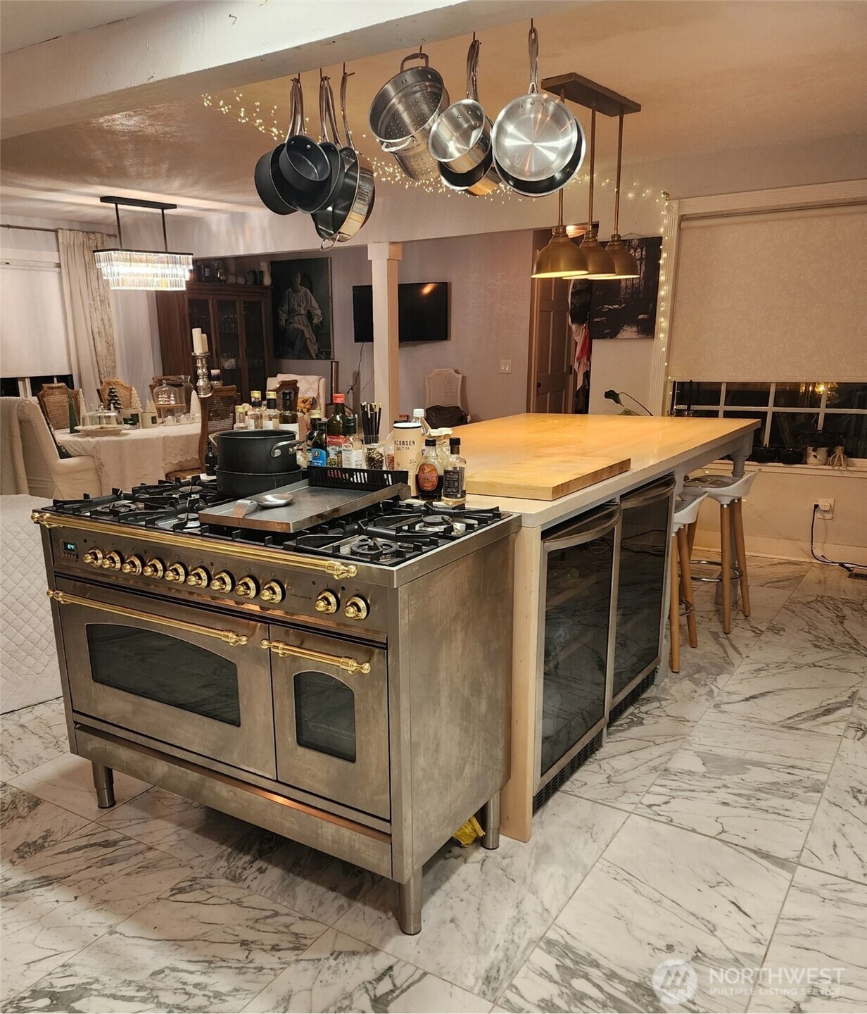 6217 Lackey Road Northwest Vaughn, WA 98394 - Photo 10 of 26 a kitchen with stainless steel appliances granite countertop a stove and a sink
