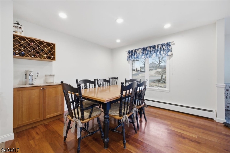 23 Lingert Avenue Clinton, NJ 08809 - Photo 11 of 43 a view of a dining room with furniture and wooden floor