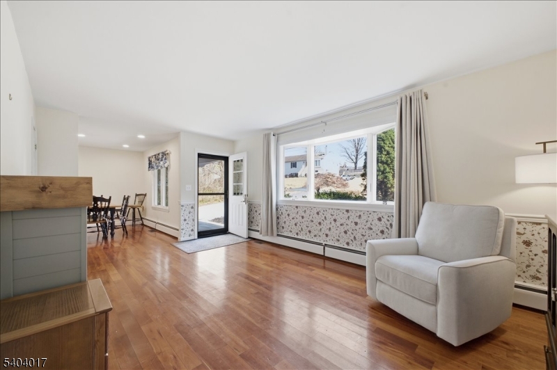 23 Lingert Avenue Clinton, NJ 08809 - Photo 12 of 43 a living room with furniture and wooden floor