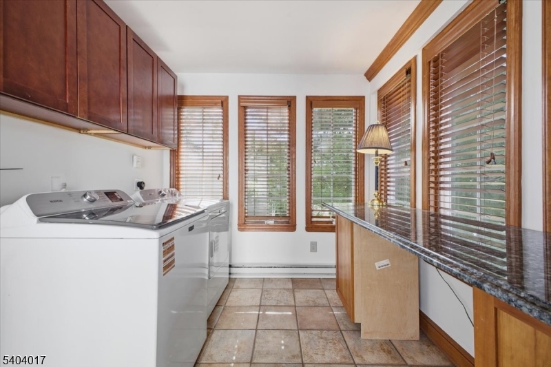 23 Lingert Avenue Clinton, NJ 08809 - Photo 20 of 43 a kitchen with a sink and large window