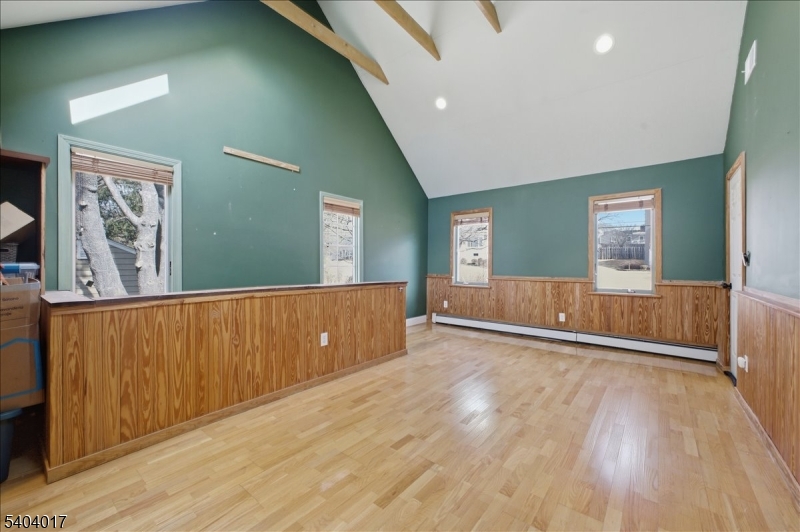 23 Lingert Avenue Clinton, NJ 08809 - Photo 29 of 43 a view of an empty room with wooden floor and a window