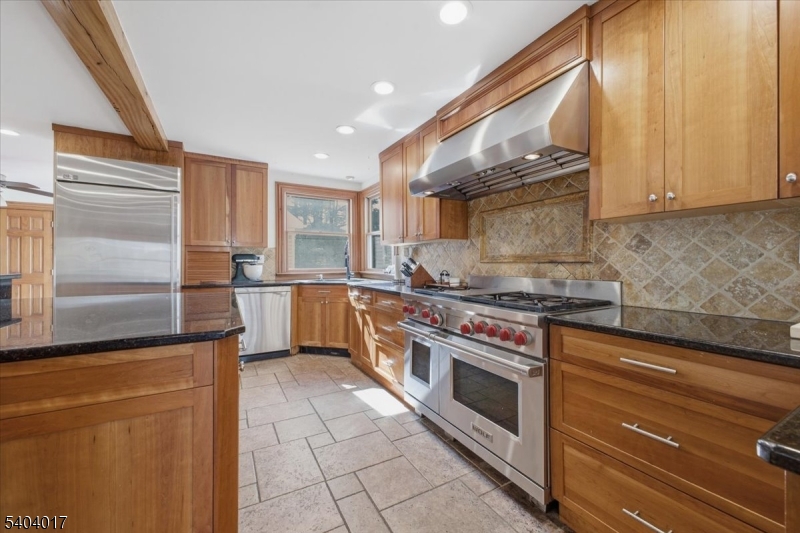 23 Lingert Avenue Clinton, NJ 08809 - Photo 3 of 43 a kitchen with stainless steel appliances granite countertop a stove a sink and a refrigerator