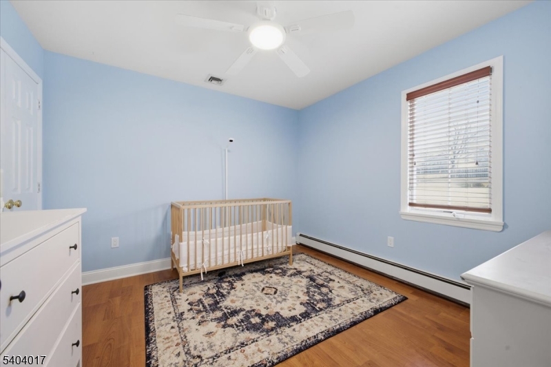 23 Lingert Avenue Clinton, NJ 08809 - Photo 31 of 43 a room with window and a rug