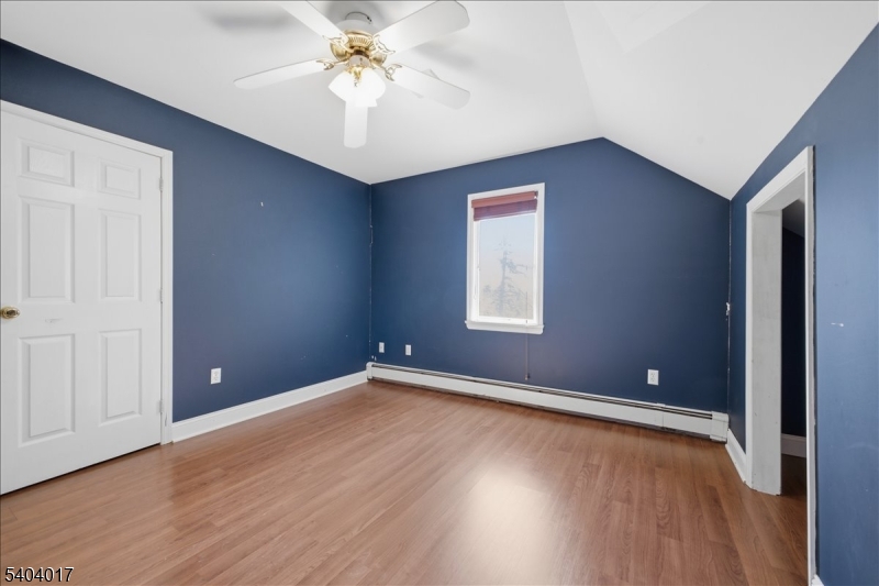 23 Lingert Avenue Clinton, NJ 08809 - Photo 33 of 43 wooden floor in an empty room with a window