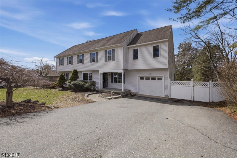23 Lingert Avenue Clinton, NJ 08809 - Photo 40 of 43 a view of a house with a yard