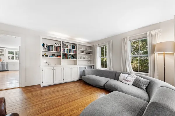 a living room with furniture and window