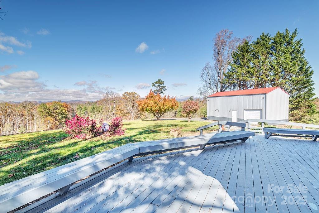 839 Jupiter Road Weaverville, NC 28787 - Photo 22 of 43 a view of a swimming pool with a lounge chairs