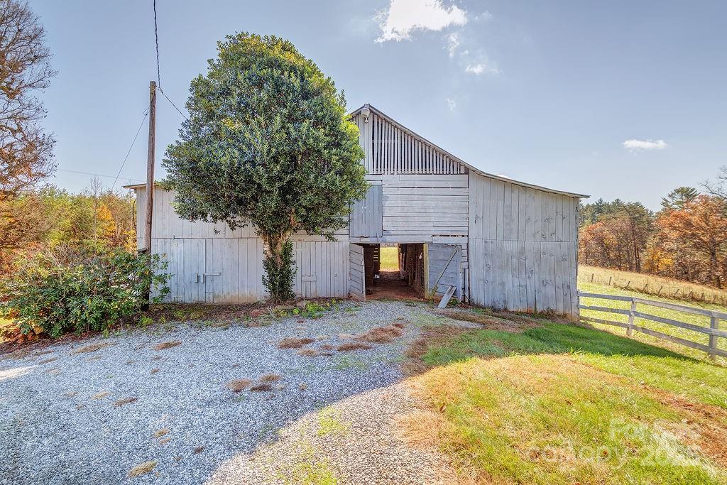839 Jupiter Road Weaverville, NC 28787 - Photo 27 of 43 a view of a backyard of the house