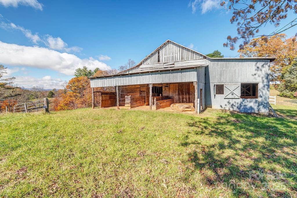 839 Jupiter Road Weaverville, NC 28787 - Photo 29 of 43 a front view of a house with a yard