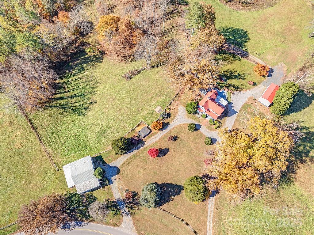 839 Jupiter Road Weaverville, NC 28787 - Photo 41 of 43 an aerial view of residential houses with outdoor space