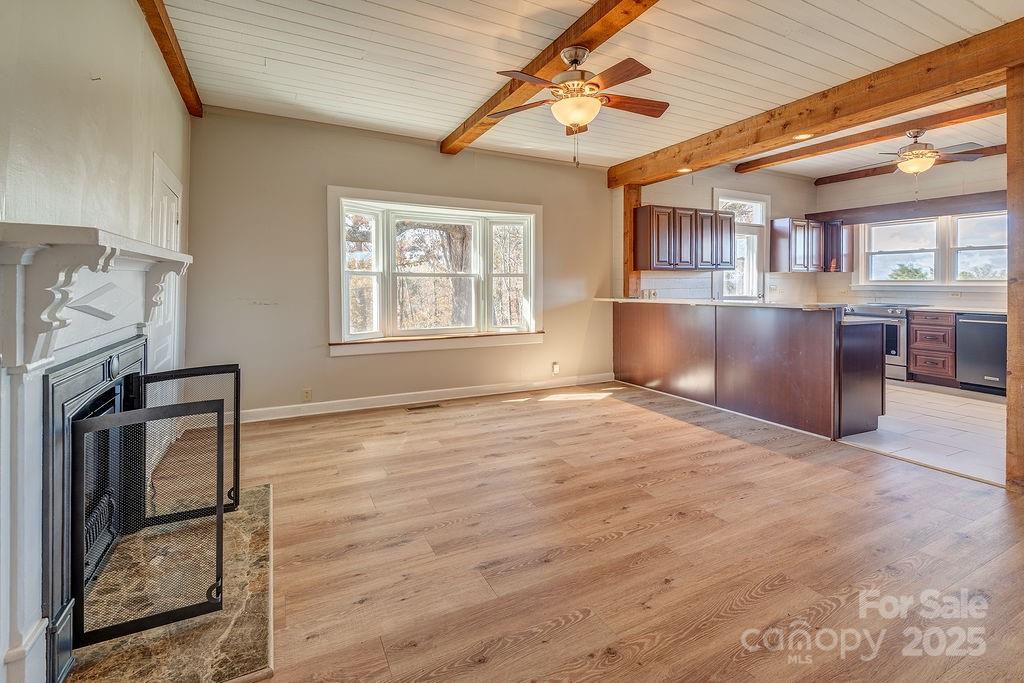 839 Jupiter Road Weaverville, NC 28787 - Photo 9 of 43 a view of an empty room with a window