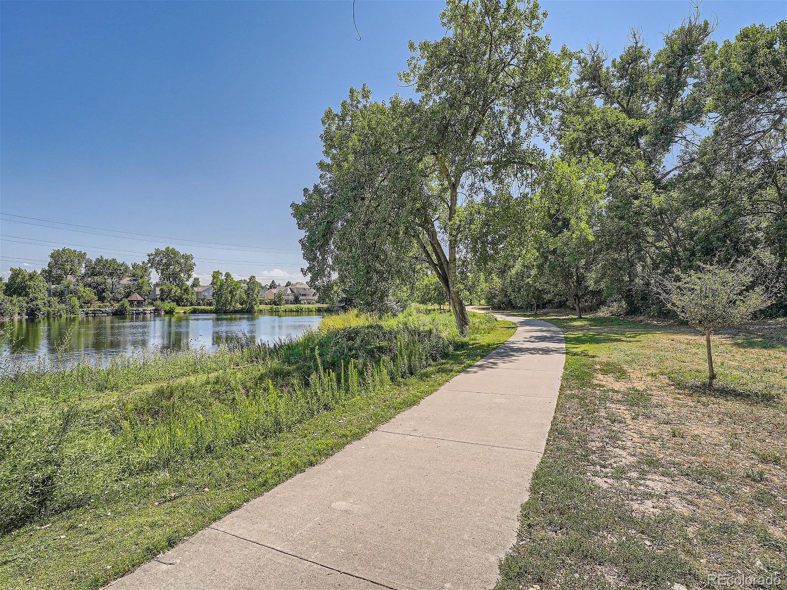 4911 Garrison Street, Unit 202G Wheat Ridge, CO 80033 - Photo 29 of 33 a view of lake